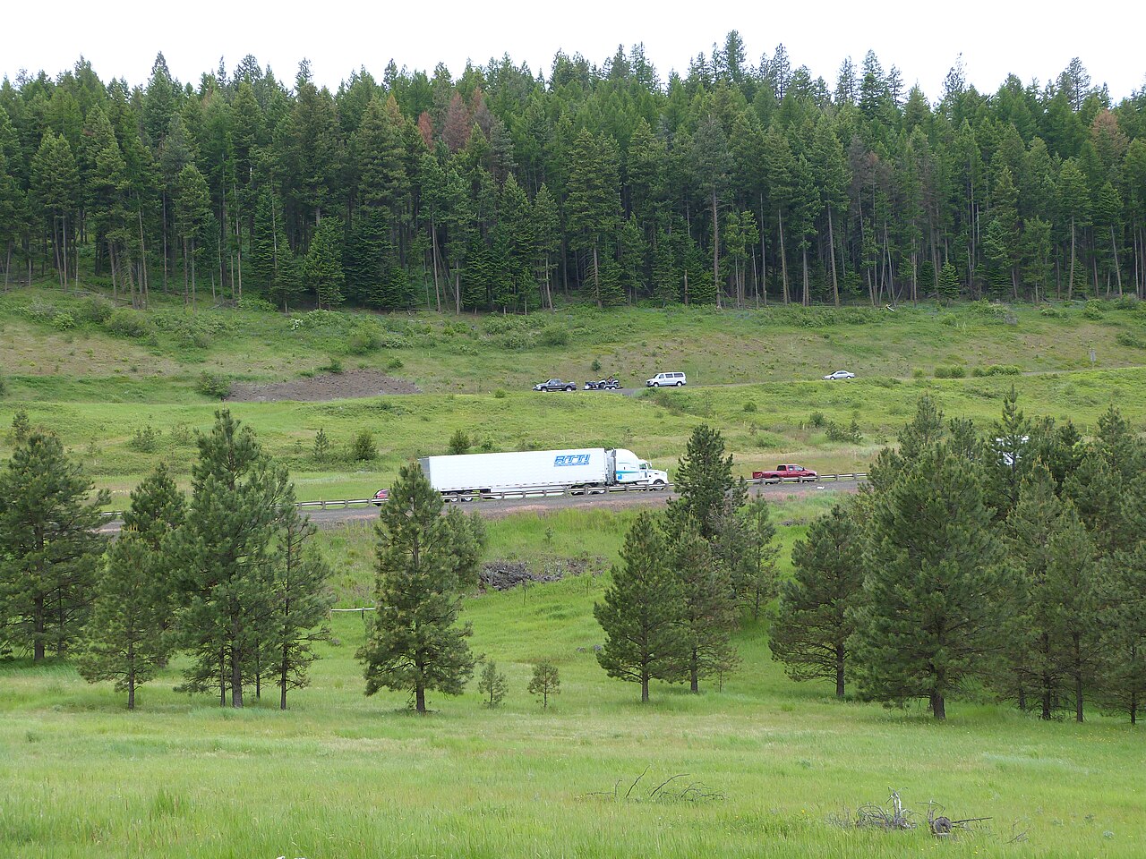 Interstate 84 climbing through the Blue Mountains of Oregon near the Blue Mountain summit, viewed from the historic Oregon Trail alignment.