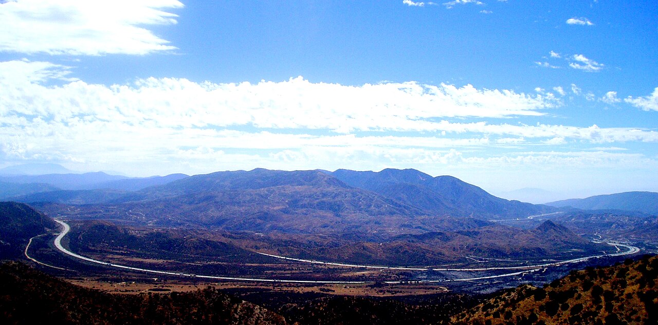 Wide-angle view of Interstate 15 passing over Cajon Summit in the San Bernardino National Forest (this is the lead/infobox image on the Cajon Pass Wikipedia article).