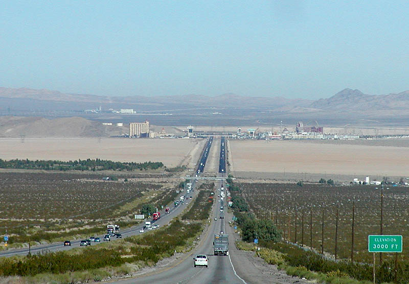 Interstate 15 drops down from Mountain Pass into the Ivanpah Valley near the California-Nevada line, the high point of the route at about 4,730 feet.