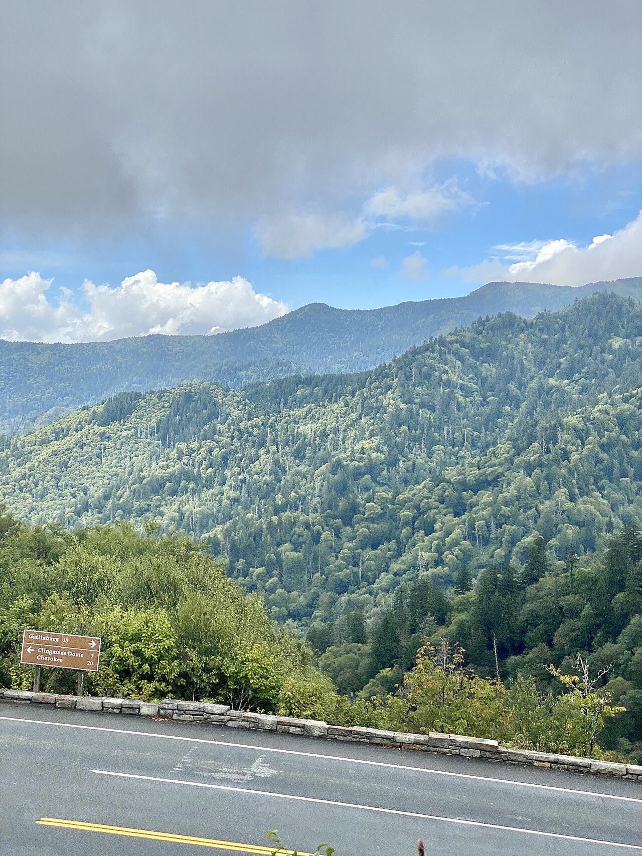 The layered ridgelines of the Great Smoky Mountains seen from the overlook at Newfound Gap, the 5,046-foot pass where US-441 crosses the Tennessee-North Carolina line.