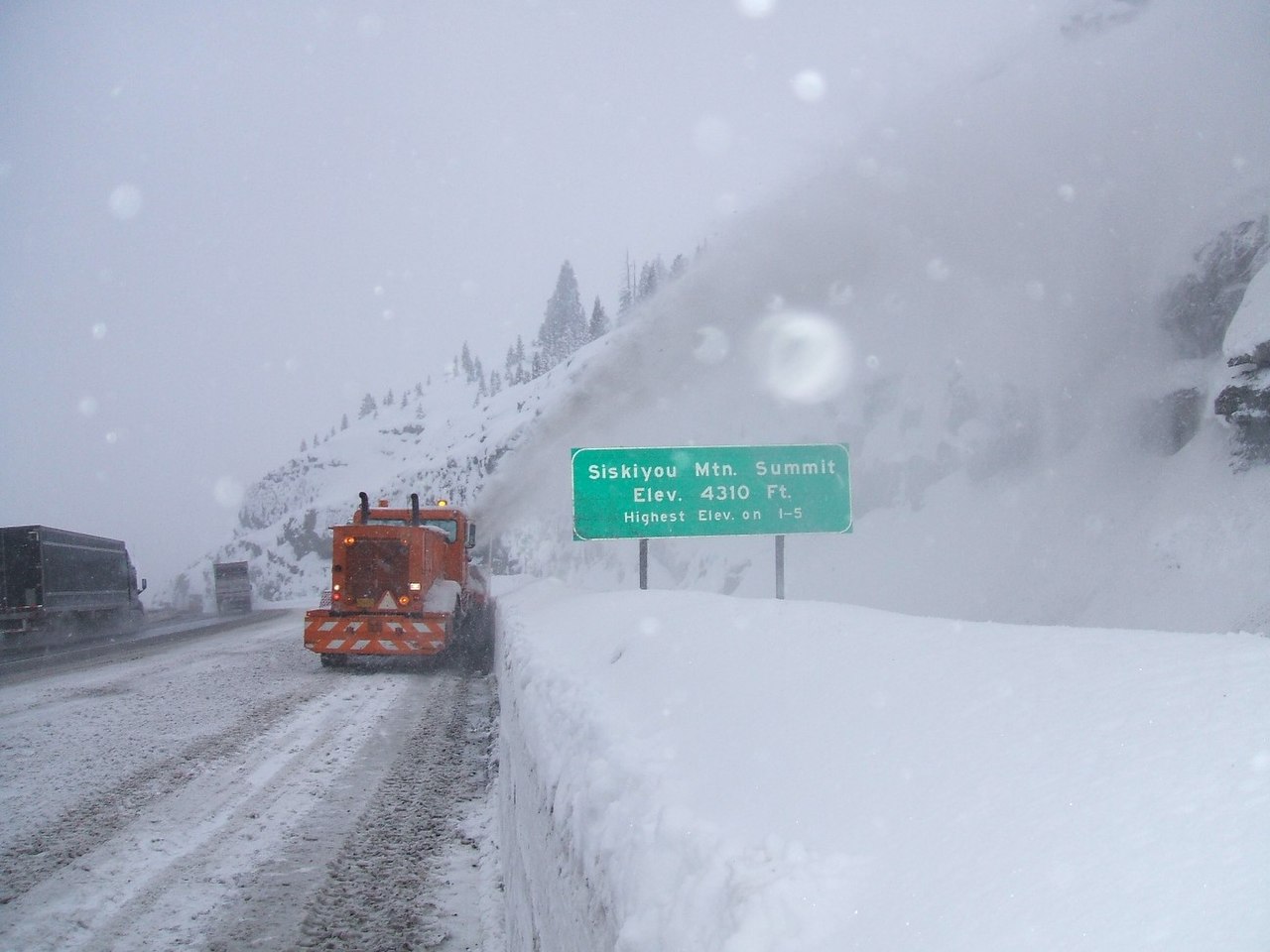 Oregon DOT crews work to clear Siskiyou Summit on Interstate 5 during a winter storm (photo Oct 10, 2008).